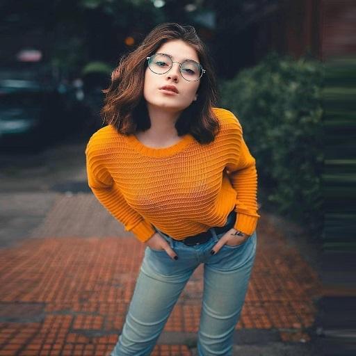 Girls poses with photos icon